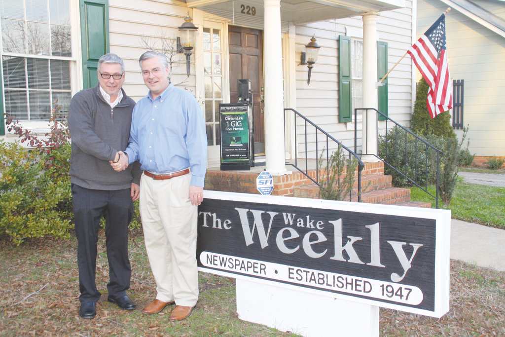 Wilson Times Co. President and Publisher Keven Zepezauer, left, is pictured with Todd Allen, who served as publisher and executive editor of the Wake Weekly newspapers.